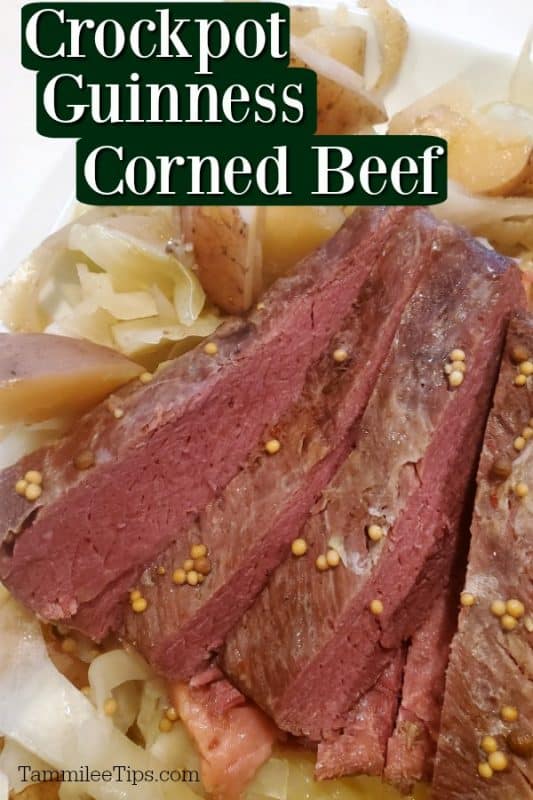 crockpot guinness corned beef and cabbage on a white plate
