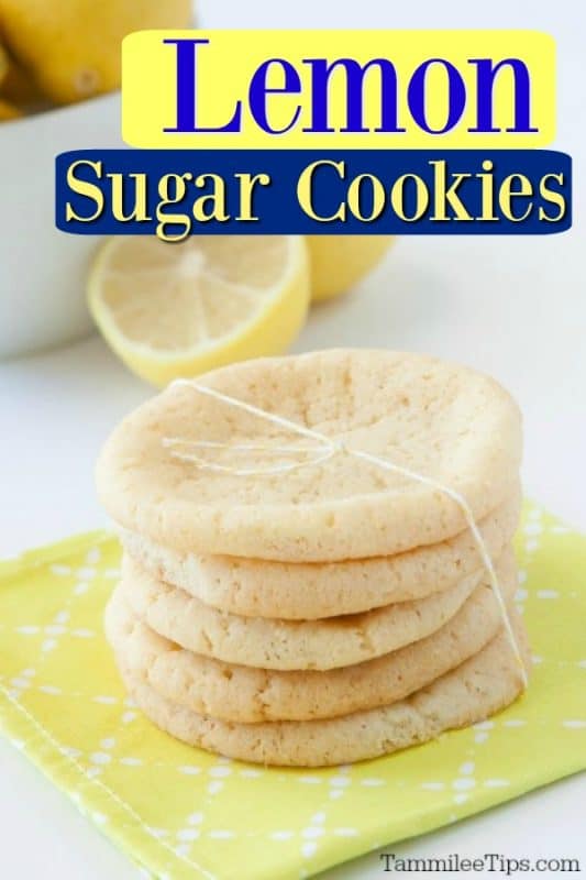 Lemon Sugar Cookies over a stack of cookies on a yellow napkin with lemons in the background