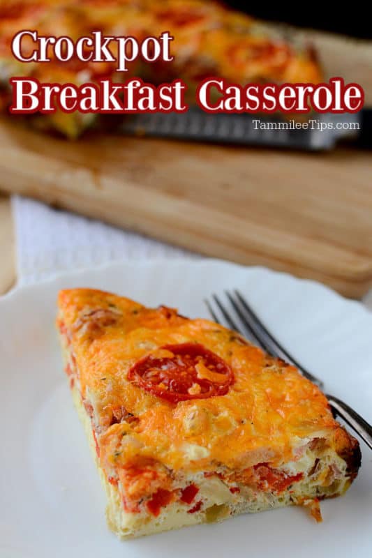 crockpot breakfast casserole over a slice of egg and tomato casserole on a white plate