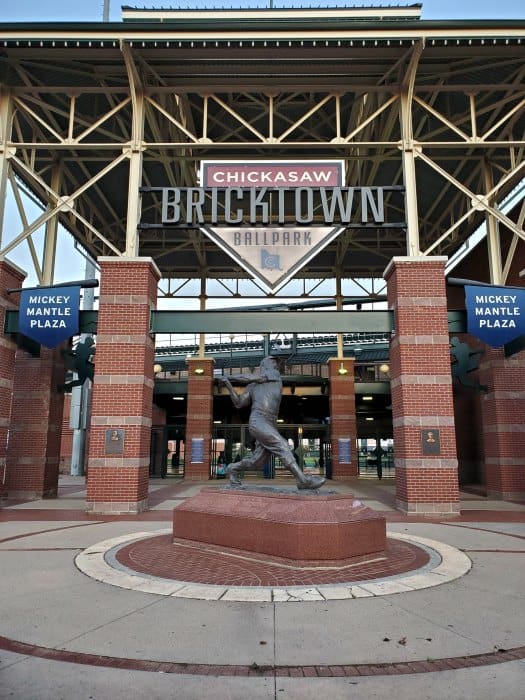 Chickasaw Bricktown Ballpark entrance with baseball player statue