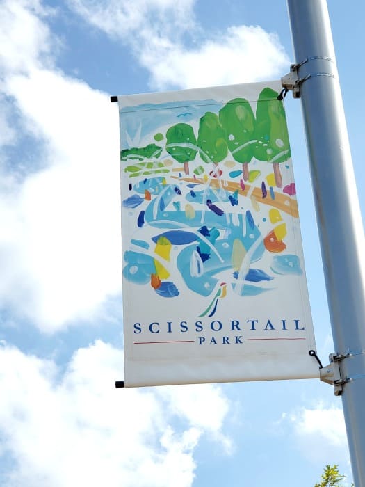 Scissortail Park sign on a pole