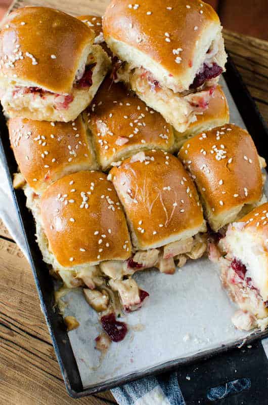 Cranberry and Leftover Turkey Sliders on a baking pan