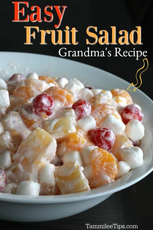 Easy Fruit salad grandma's recipe over a white bowl filled with fruit salad with marshmallows