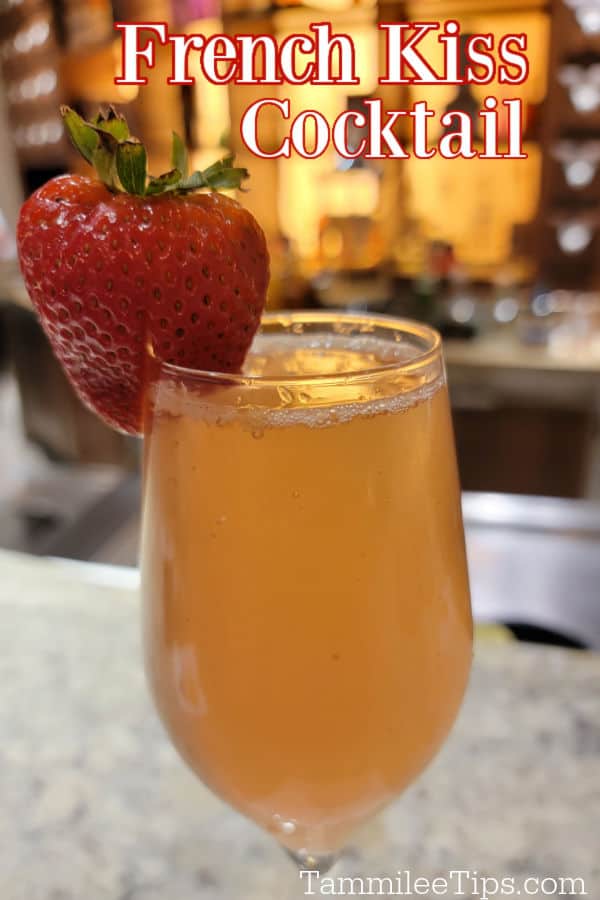 French Kiss Cocktail text over a champagne glass with a strawberry garnish