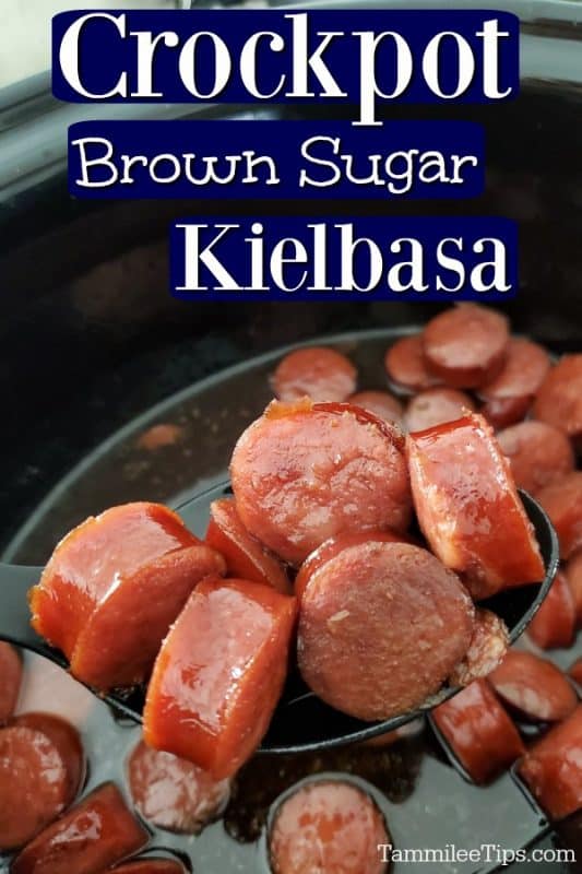 Crockpot Brown Sugar Kielbasa over a slow cooker bowl with a spoon lifting cut kielbasa