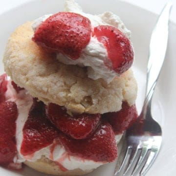 Easy Strawberry Shortcake on a white plate with a fork