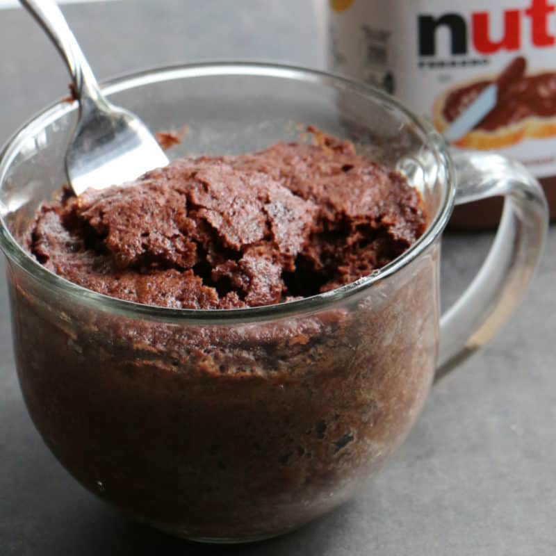 Nutella Mug Cake with a fork in a glass mug