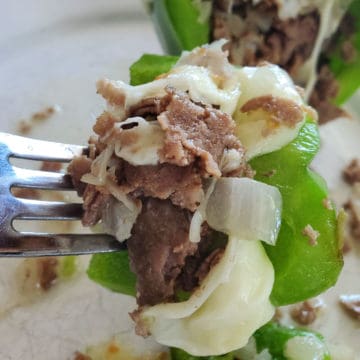 philly cheesesteak stuffed pepper on a fork