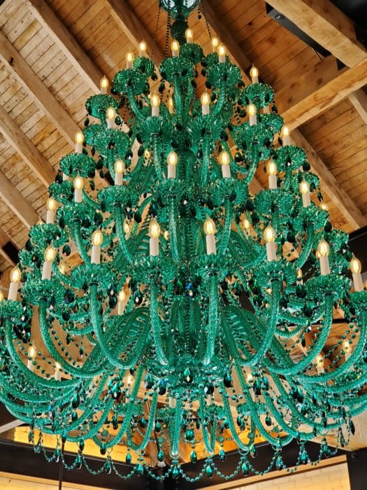 Green Swarovski chandelier hanging 