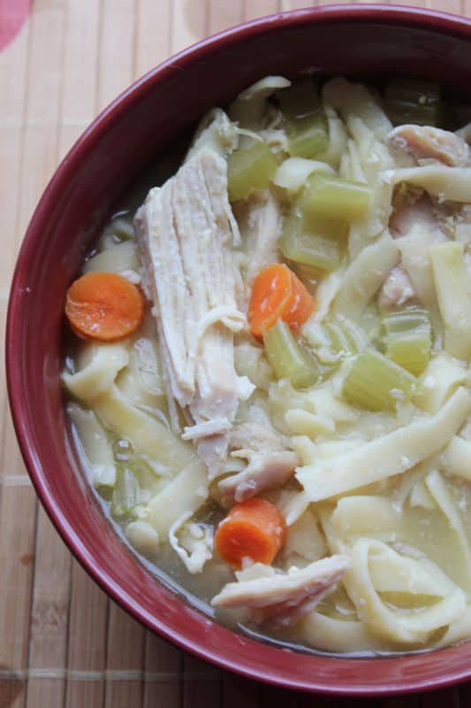 Crockpot Chicken Noodle Soup in a red bowl