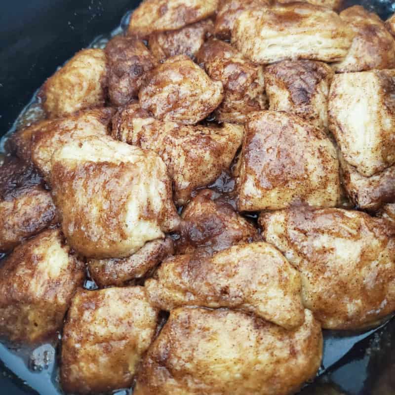 Crockpot Monkey Bread in slow cooker black bowl