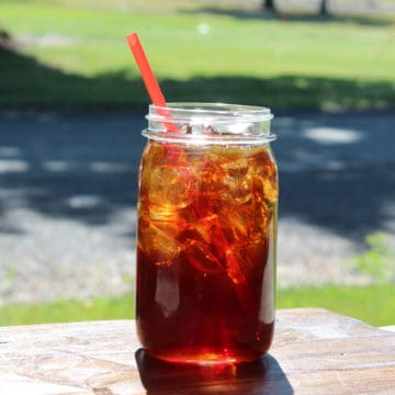 McDonalds Sweet Tea in a mason jar with a red straw