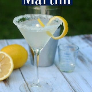 Lemon Drop Martini text over a martini glass, cocktail shaker, and lemon
