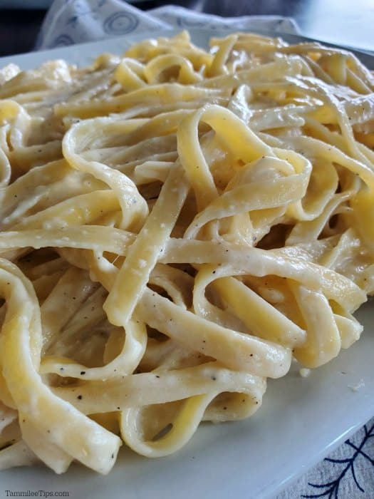 Close up Olive Garden Fettuccine Alfredo Sauce on a white platter