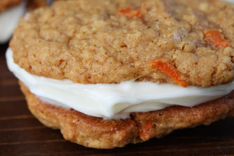 close up of carrot oatmeal cookies with cream cheese icing to make a carrot cookie whoopie pie