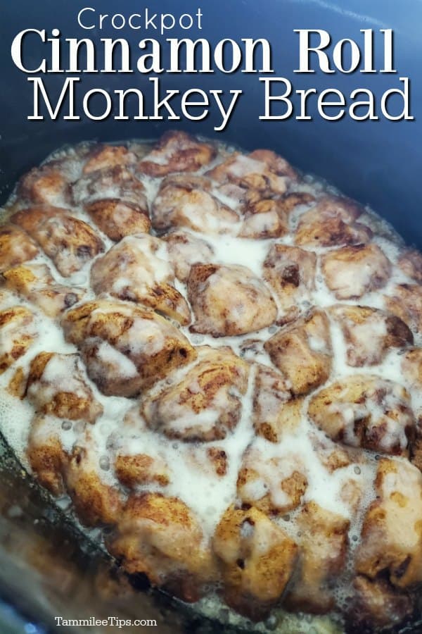 Crockpot Cinnamon Roll Monkey Bread over a slow cooker with cinnamon rolls and icing