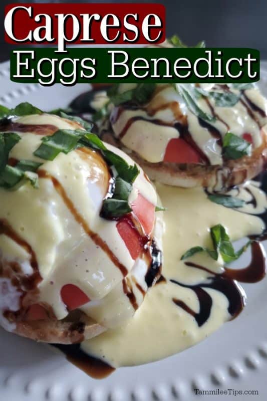 Caprese Eggs Benedict over a white plate with benedicts covered in Hollandaise sauce and balsamic glaze