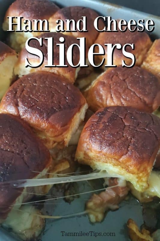 Ham and Cheese Sliders over a dish with ham and cheese funeral sandwiches