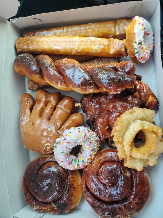 Box of multiple types of donuts