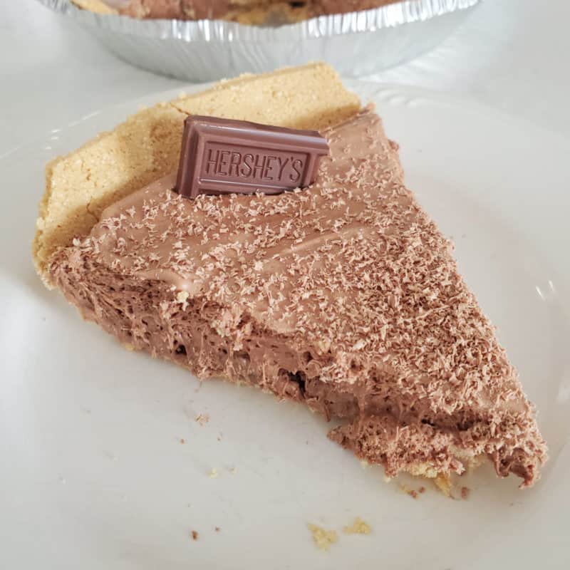 Slice of Hershey no bake pie on a white plate