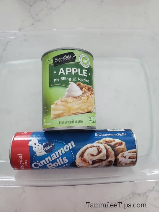 Apple Pie Filling can and cinnamon roll container in a glass baking dish