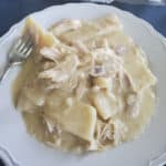 Cracker barrel chicken and dumplings on a white plate