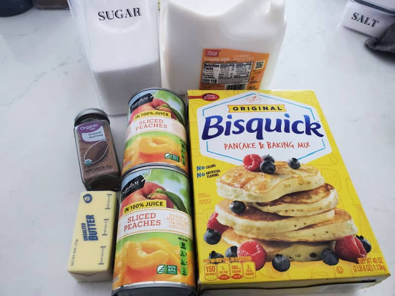sugar, milk, nutmeg, canned peaches, butter, and Bisquick mix