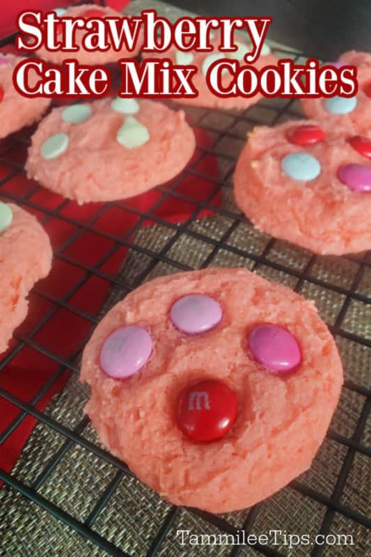 Strawberry Cake Mix Cookies text printed over pink cookies on a wire rack