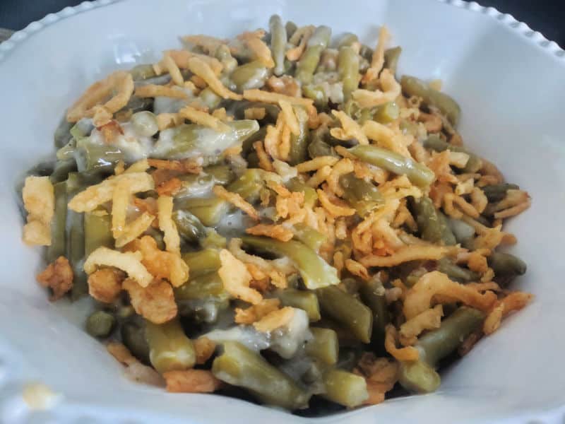 campbells green bean casserole in a white serving bowl