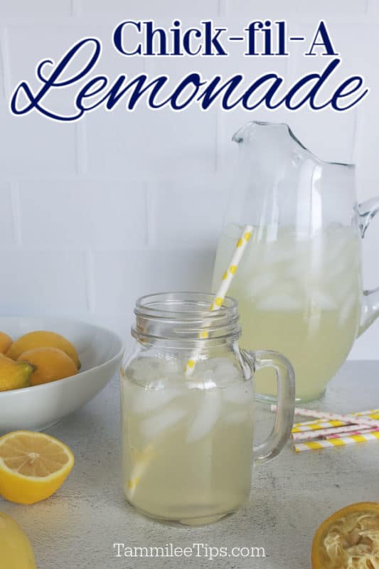 Chick fil A lemonade over a pitcher and mason jar filled with lemonade. Sitting next to a bowl of lemons and cut lemons. 