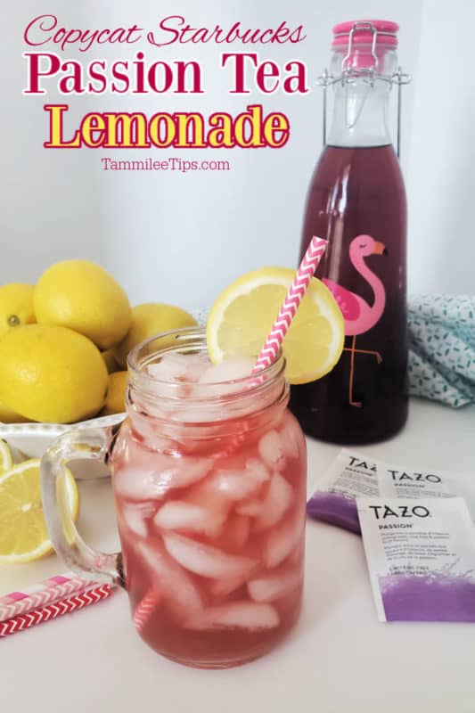 Copycat Starbucks Passion Tea Lemonade over a mason jar filled with tea garnished with a straw and lemon wheel, Tazo passion tea, a bowl of lemons and pitcher of tea. 