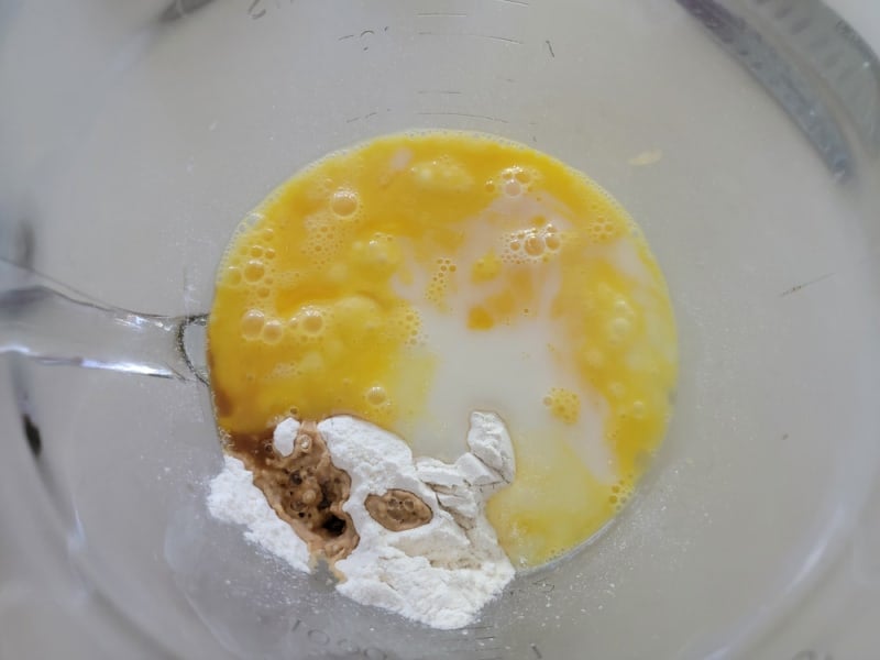 German Apple Pancake batter in a glass bowl