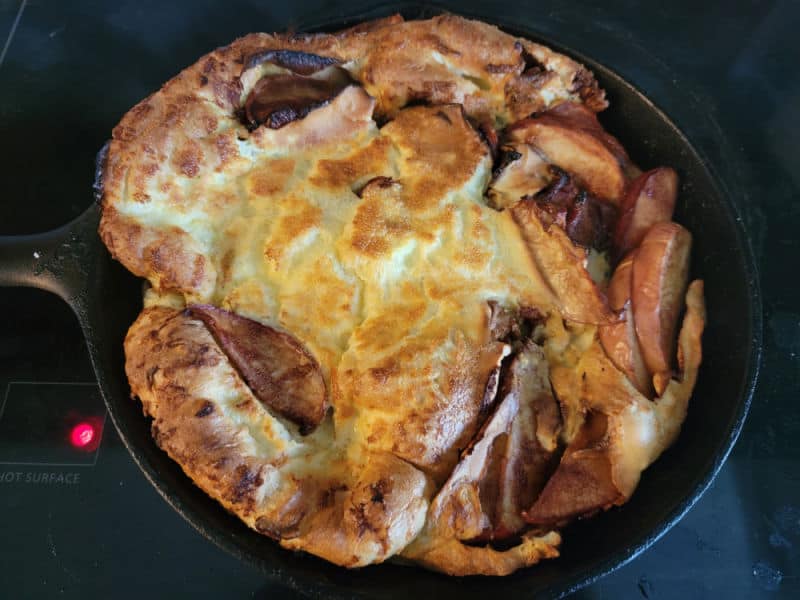 Baked German apple pancake in a cast iron skillet