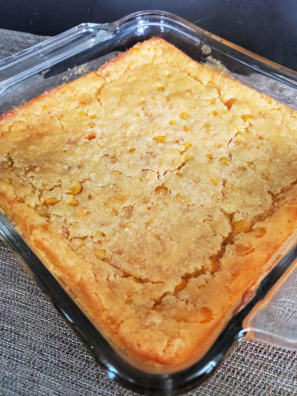 creamed corn casserole in a baking dish