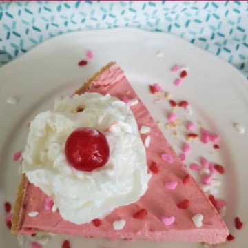 Kool Aid Pie text over a slice of pink kool aid pie with whipped cream and a cherry