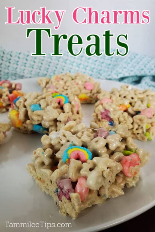 Lucky Charms treats over a plate with lucky charms rice krispie treats on a white plate