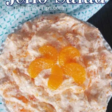 Mandarin Orange Jello Salad text over a bowl of orange jello fluff salad
