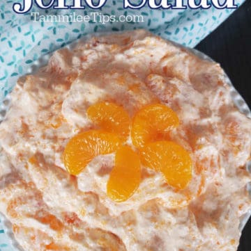 Mandarin Orange Jello Salad text over a bowl of orange jello fluff salad
