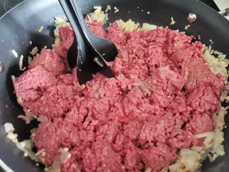 mix n chop in ground beef and onion in a skillet