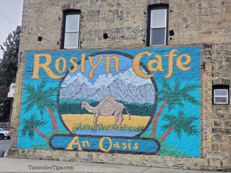 Roslyn Cafe camel mural on a brick building