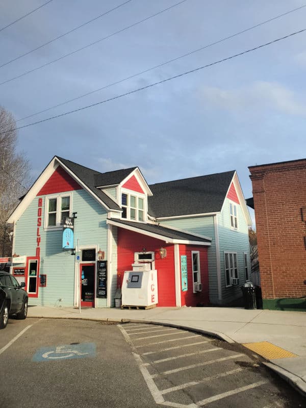 blue and red building with Roslyn down the side and an ice machine