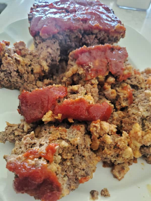Pieces of Stove Top Meatloaf on a white plate
