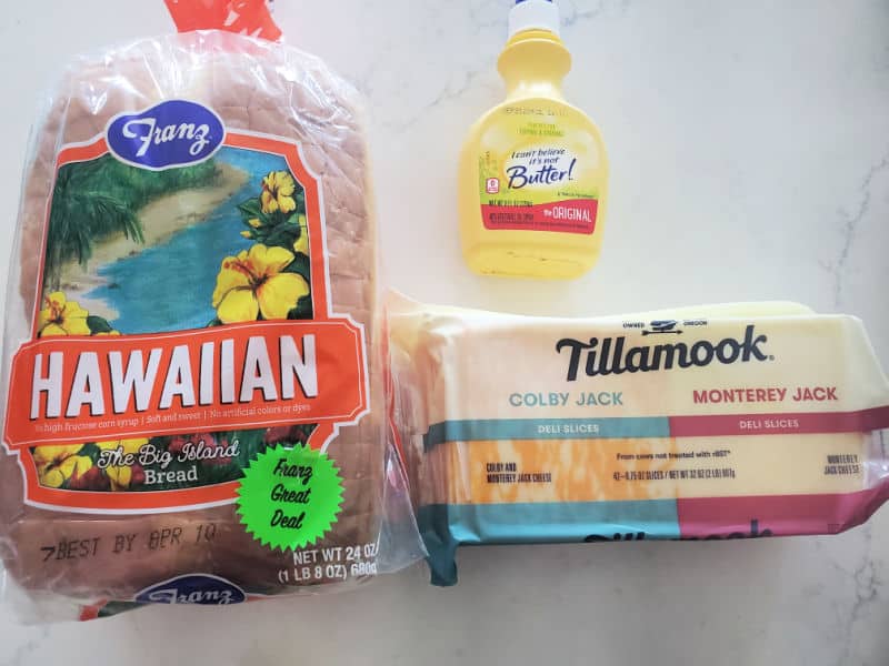 Hawaiian bread, butter spray, and a package of Tillamook sliced cheese 