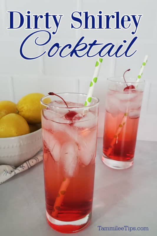 Dirty Shirley Cocktail text over two glasses with red drinks, maraschino cherries, and paper straws next to a bowl of lemons