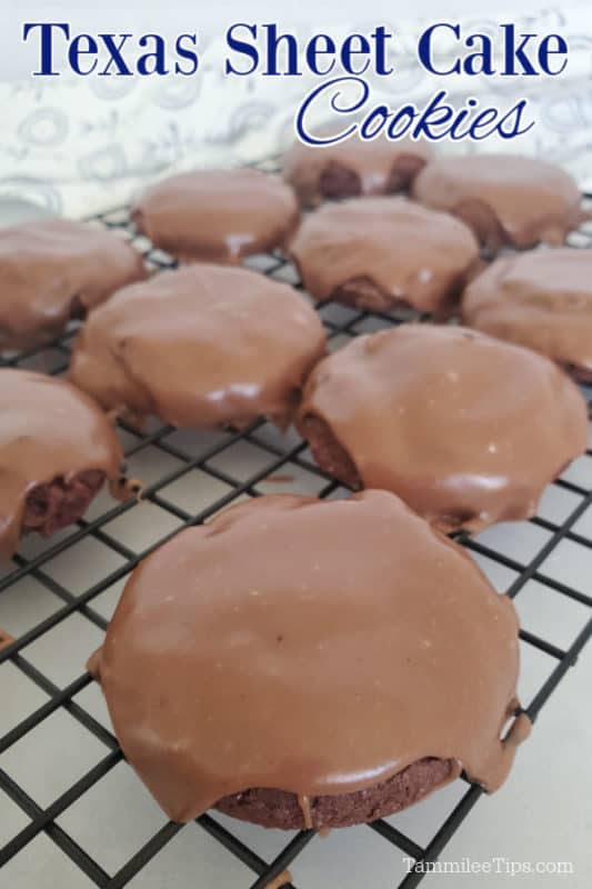 Texas Sheet Cake Cookies on a drying rack with a cloth napkin behind them