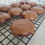 Texas sheet cake cookies on a metal cooling rack