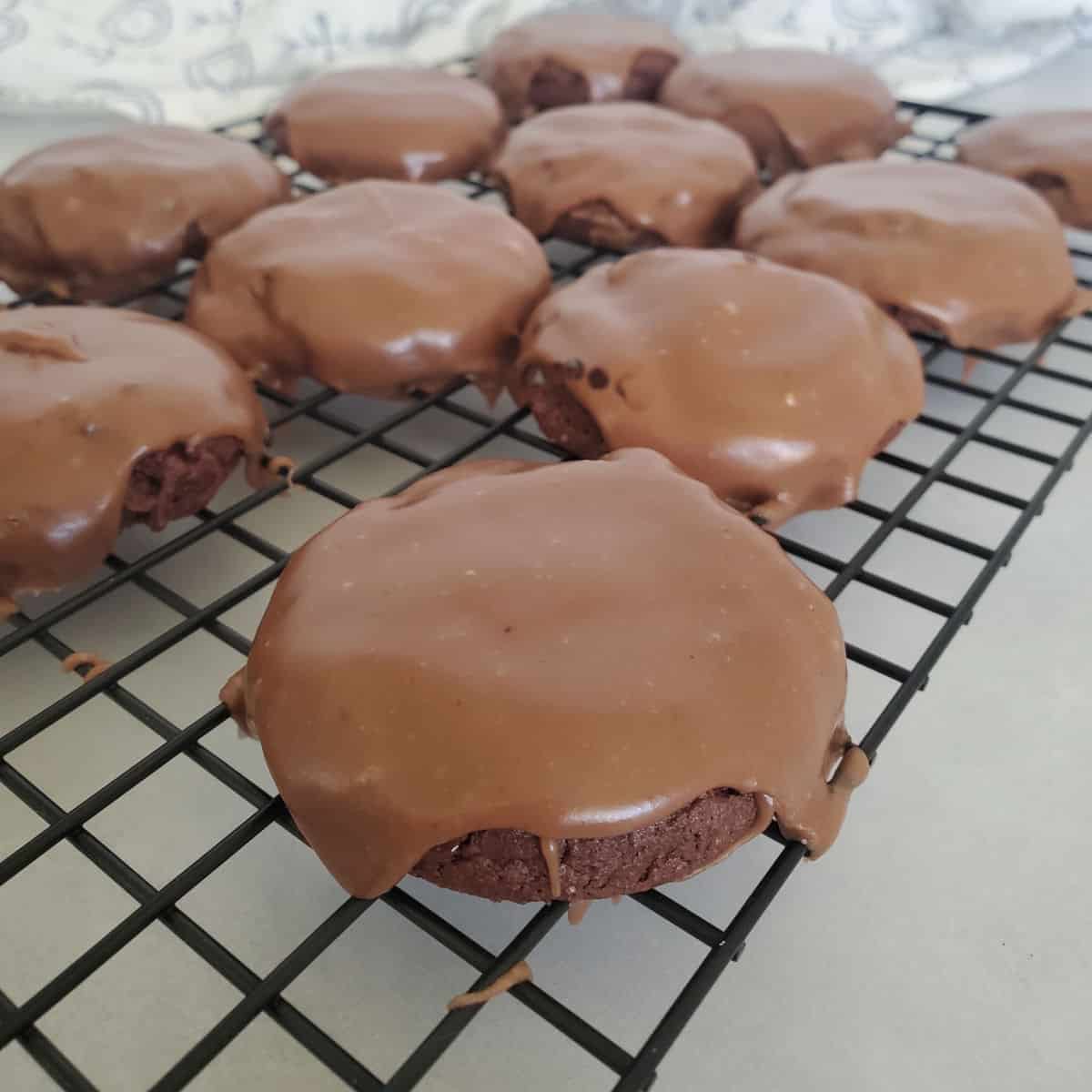 Texas sheet cake cookies on a metal cooling rack