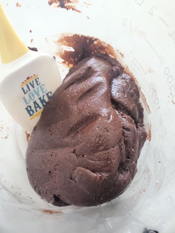 Texas sheet cake cookie dough in a bowl with a spatula