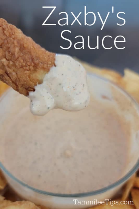 Zaxby's Sauce over a chicken tender dipped in sauce and a glass bowl