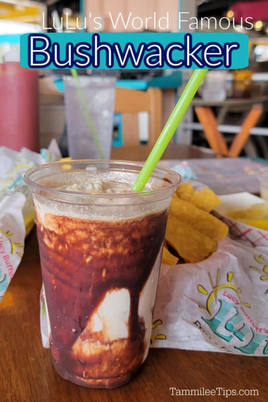 LuLu's Bushwacker text over a chocolate cream cocktail in a plastic cup